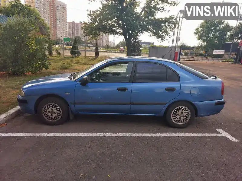 Mitsubishi Carisma 2000, фото з оголошення 2 з 9, VIN XMCLNDA1AYF052082