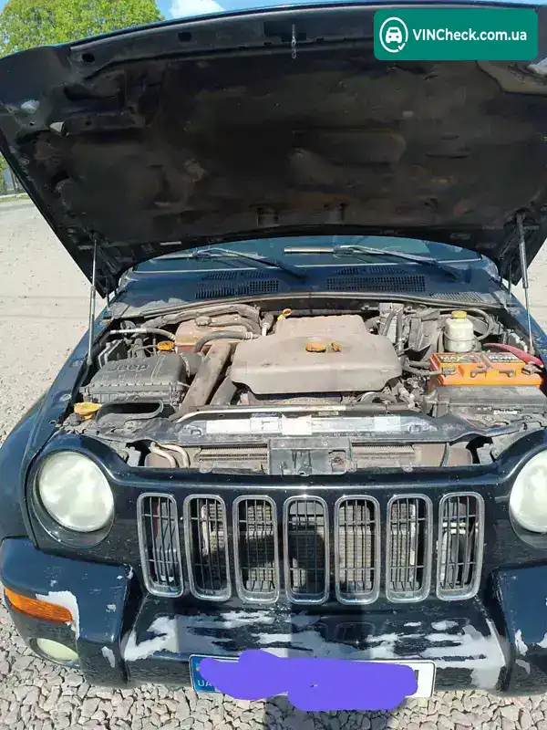 Jeep Cherokee 2003, фото з оголошення 2 з 14, VIN 1J8GLE8553W681625