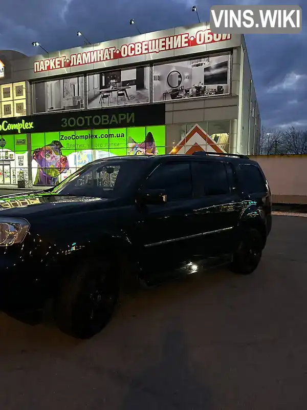 Honda Pilot 2012, фото з оголошення 2 з 17, VIN 5KBYF4880CB401494