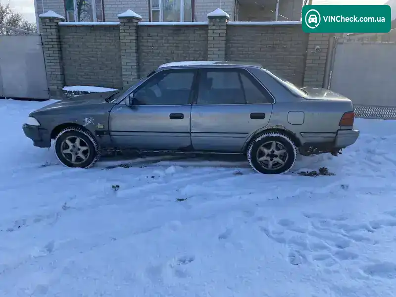Toyota Carina 1989, фото з оголошення 2 з 14, VIN JT1EAT17100040658