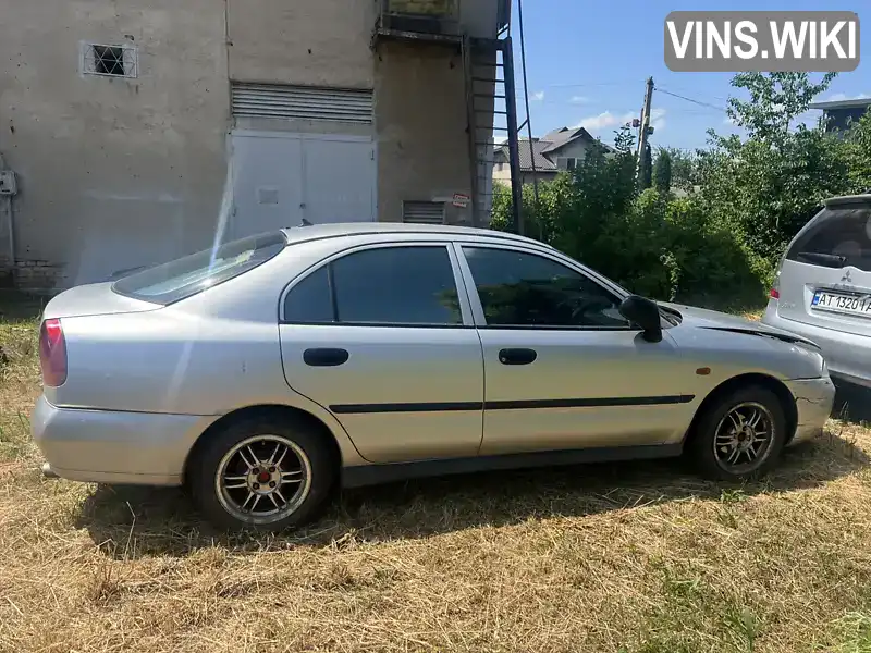 Mitsubishi Carisma 1997, фото з оголошення 1 з 21, VIN XMCLNDA1AWF012114
