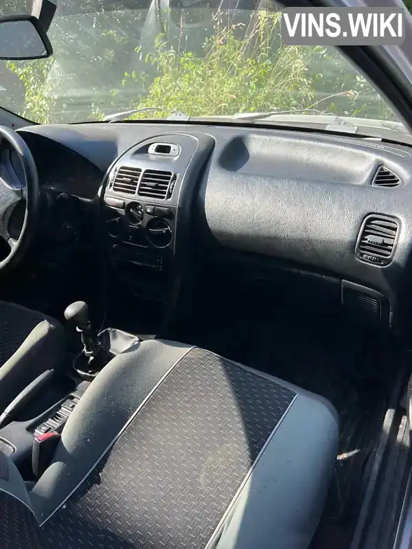 Mitsubishi Carisma 1997, фото з оголошення 2 з 21, VIN XMCLNDA1AWF012114