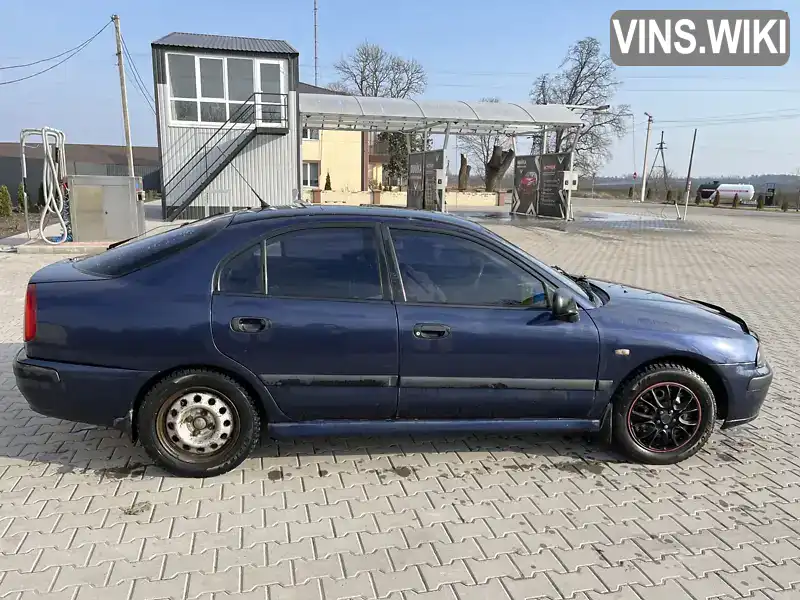 Mitsubishi Carisma 2002, фото з оголошення 1 з 7, VIN XMCLNDA1A2F015075