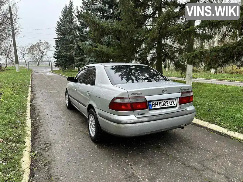 Mazda 626 1997, фото з оголошення 2 з 13, VIN JMZGF12P201126965