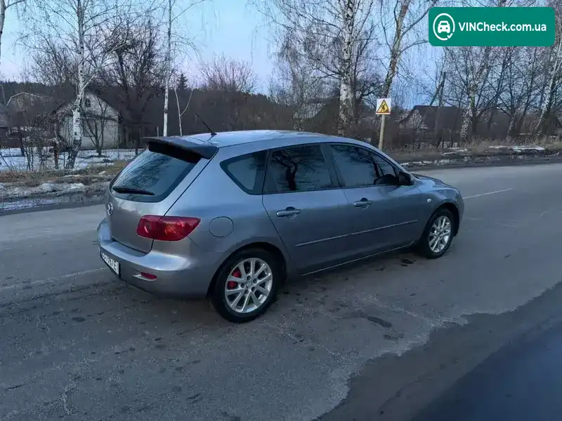 Mazda 3 2004, фото з оголошення 2 з 21, VIN JMZBK14Z251227564