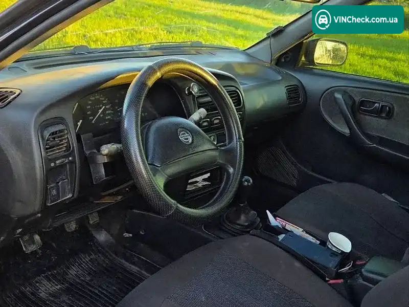 Nissan Primera 1991, фото з оголошення 2 з 9, VIN SJNBAAP10M0068877
