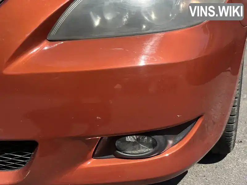 Mazda 3 2004, фото з оголошення 2 з 11, VIN JMZBK12Z551169701