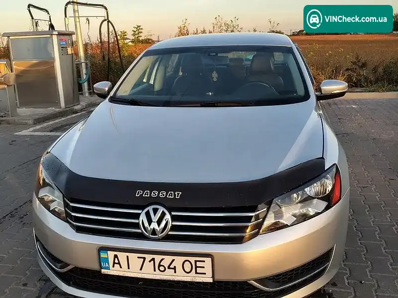 Volkswagen Passat 2014, фото з оголошення 1 з 9, VIN 1VWAT7A31EC096799