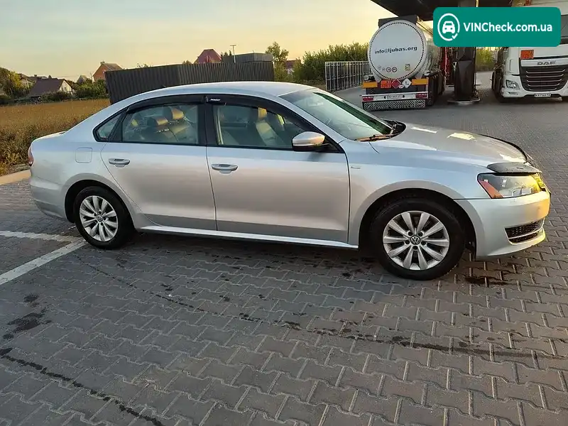 Volkswagen Passat 2014, фото з оголошення 2 з 9, VIN 1VWAT7A31EC096799