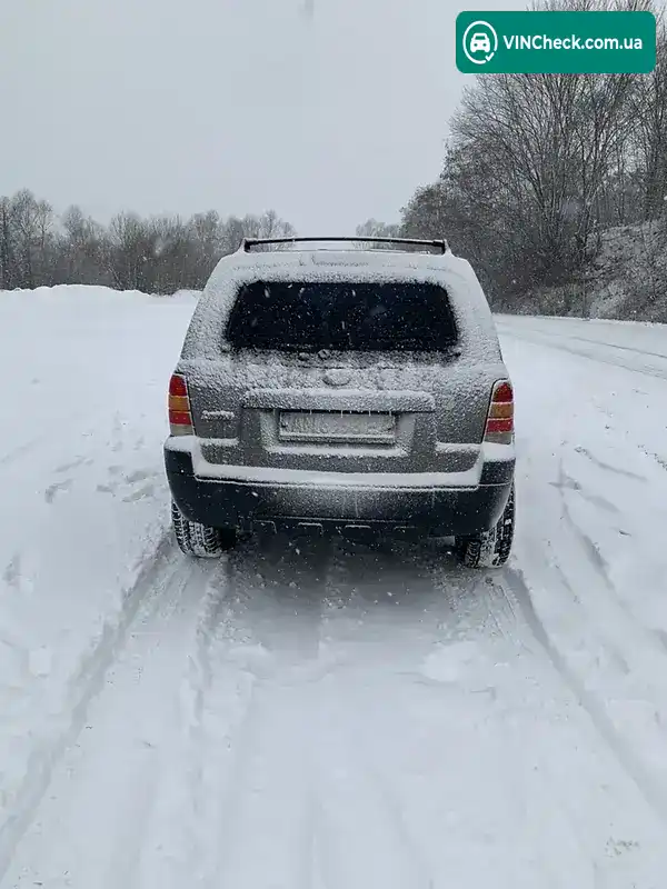 Ford Escape 2004, фото з оголошення 2 з 13, VIN 1FMYU03105DA20711