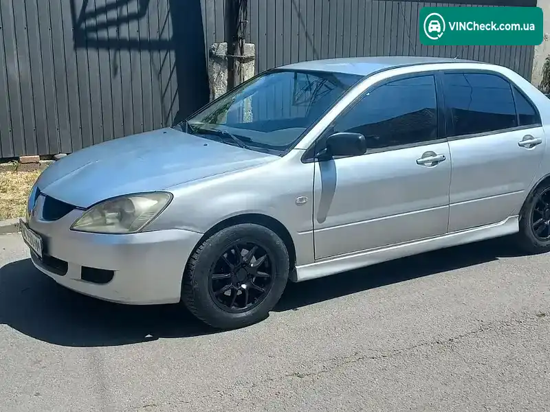 Mitsubishi Lancer 2004, фото з оголошення 2 з 14, VIN JMBSRCS3A4U003643