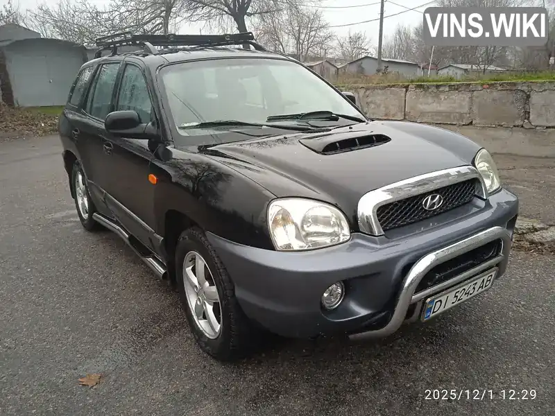Hyundai Santa FE 2001, фото з оголошення 2 з 21, VIN KMHSC81VP2U153322