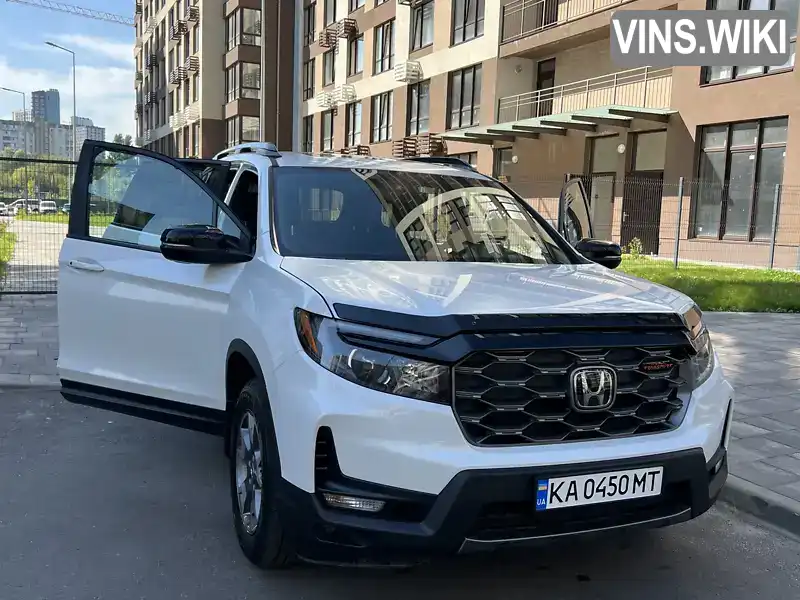 Honda Passport 2022, фото з оголошення 2 з 21, VIN 5FNYF8H67NB010381