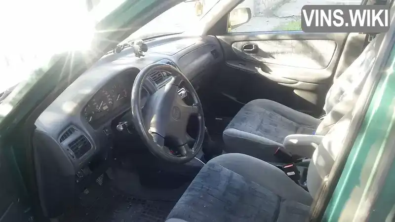 Mazda 626 1999, фото з оголошення 2 з 14, VIN JMZGW19R201134260