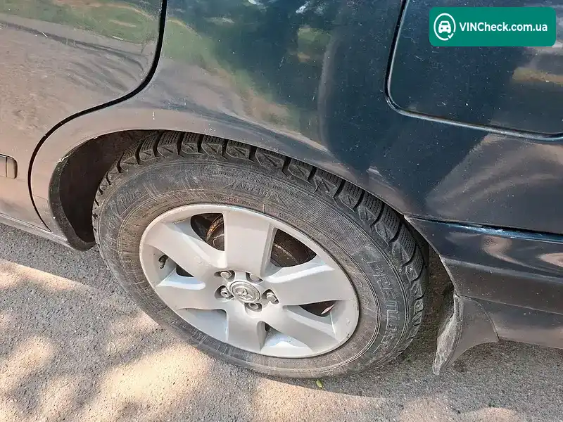 Toyota Carina 1993, фото з оголошення 2 з 10, VIN JT164STK100007794