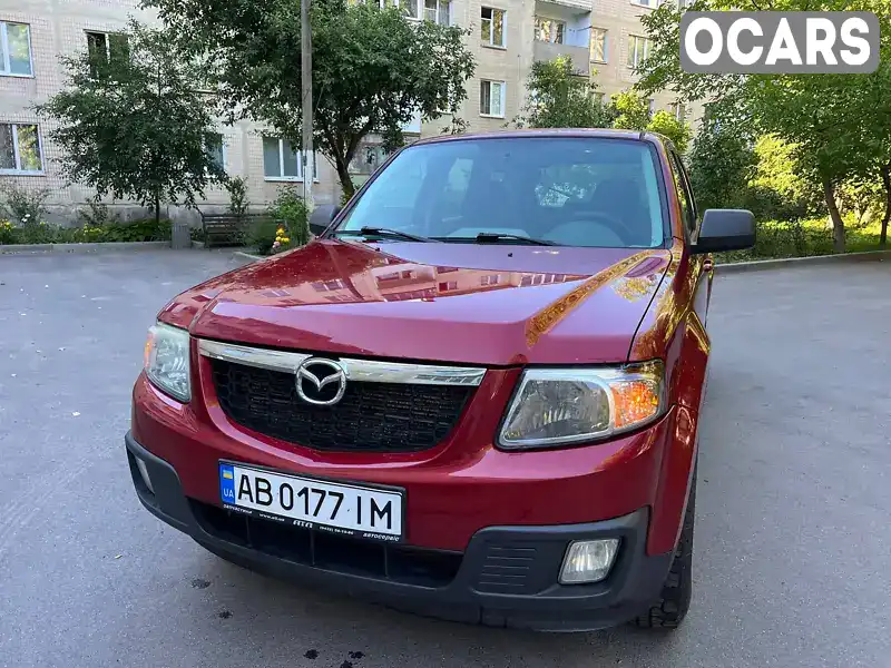 Mazda Tribute 2011, фото з оголошення 1 з 19, VIN 4F2CY0C79BKM05165