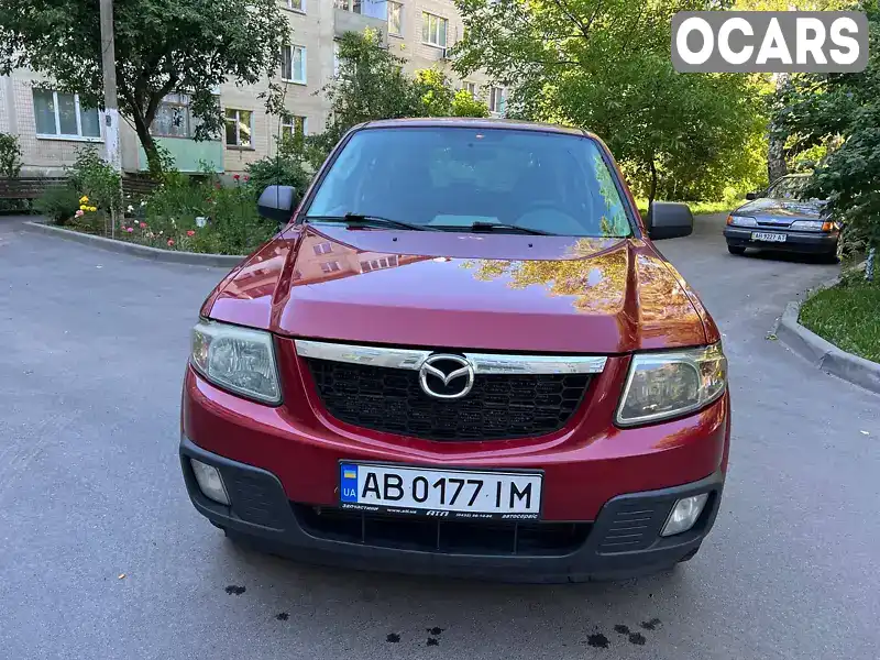 Mazda Tribute 2011, фото з оголошення 2 з 19, VIN 4F2CY0C79BKM05165