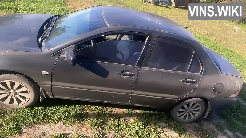 Mitsubishi Lancer 2004, фото з оголошення 1 з 11, VIN JMBSNCS3A4U008294