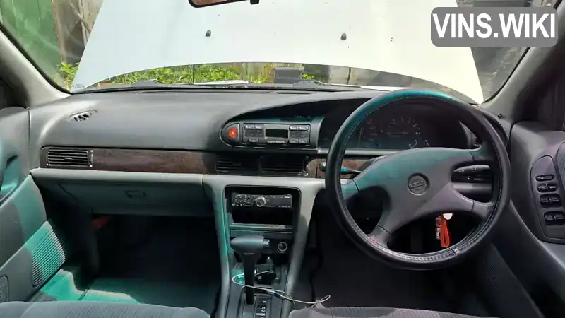 Nissan Bluebird 1992, фото з оголошення 2 з 11, VIN JN1HU1300N3087773