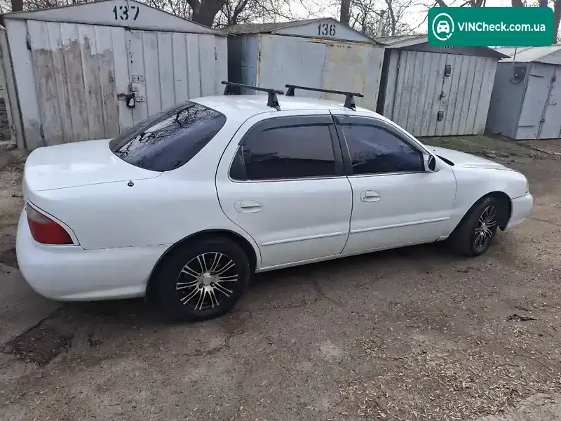Kia Clarus 2000, фото з оголошення 2 з 10, VIN KNAGC2292Y5531561