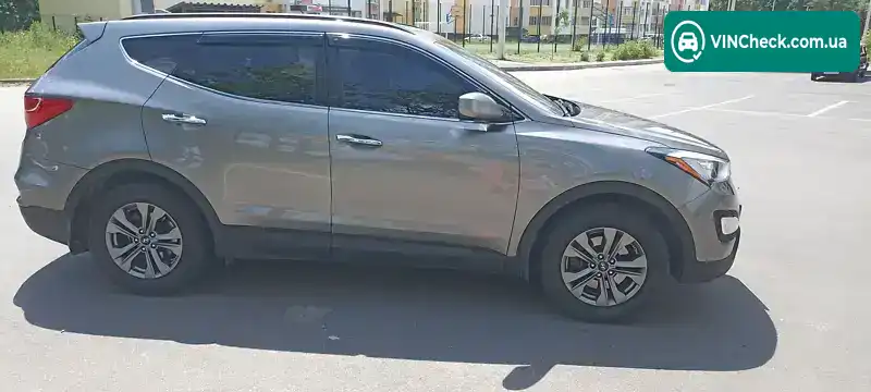 Hyundai Santa FE 2015, фото з оголошення 2 з 16, VIN 5XYZUDLB8FG291818