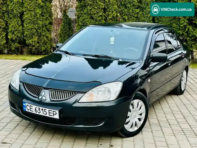 Mitsubishi Lancer 2003, фото з оголошення 1 з 21, VIN JMBSNCS3A4U002904