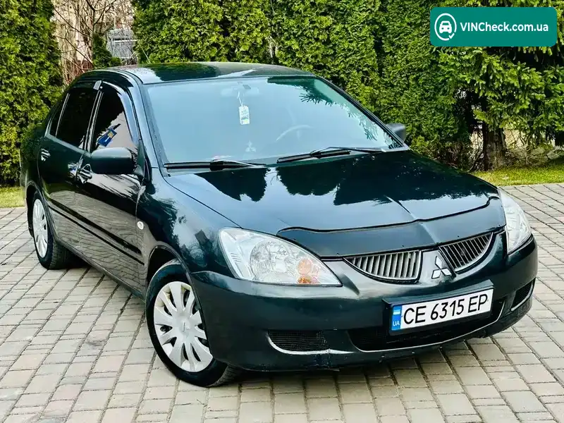 Mitsubishi Lancer 2003, фото з оголошення 2 з 21, VIN JMBSNCS3A4U002904