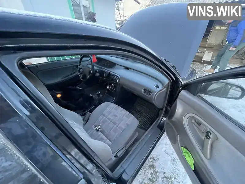 Mazda 626 1995, фото з оголошення 2 з 13, VIN JMZGE144201239780