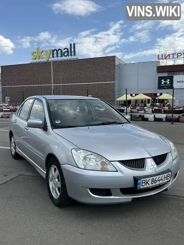 Mitsubishi Lancer 2003, фото з оголошення 1 з 21, VIN JMBSNCS3A4U000235