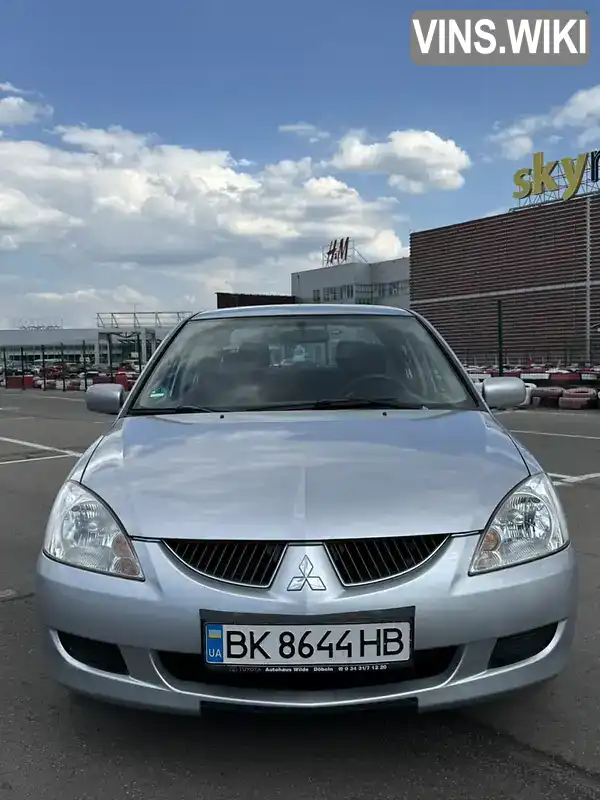 Mitsubishi Lancer 2003, фото з оголошення 2 з 21, VIN JMBSNCS3A4U000235