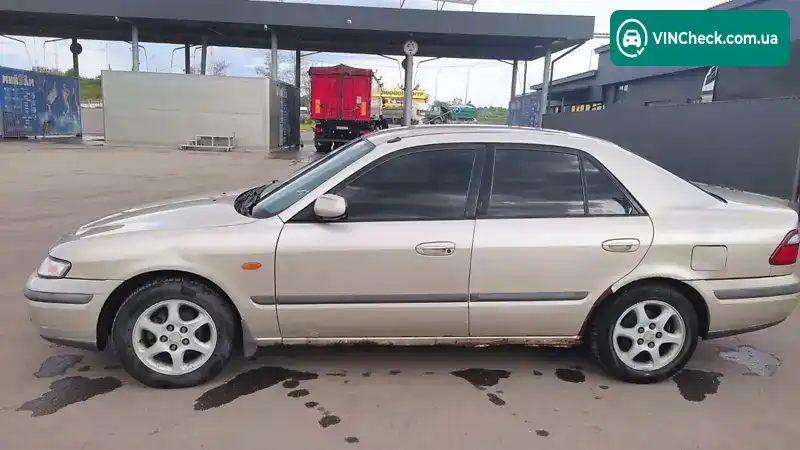 Mazda 626 1998, фото з оголошення 1 з 9, VIN JMZGF12P201209628