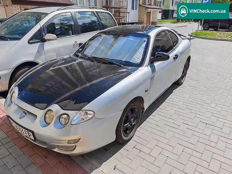 Hyundai Coupe 1999, фото з оголошення 1 з 8, VIN KMHJG21RPYU147556