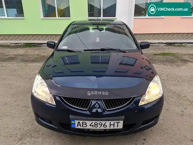 Mitsubishi Lancer 2003, фото з оголошення 2 з 20, VIN JMBLNCS3W4U006037