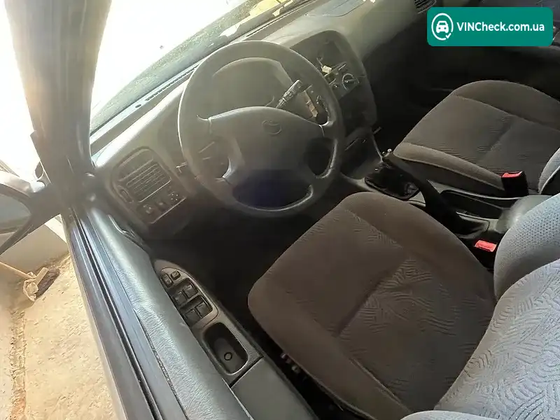 Toyota Avensis 1998, фото з оголошення 2 з 9, VIN SB164ABN10E016889