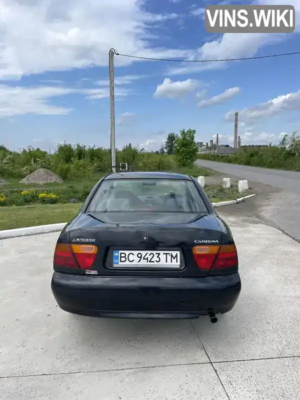 Mitsubishi Carisma 1998, фото з оголошення 2 з 21, VIN XMCSNDA1AWF065373