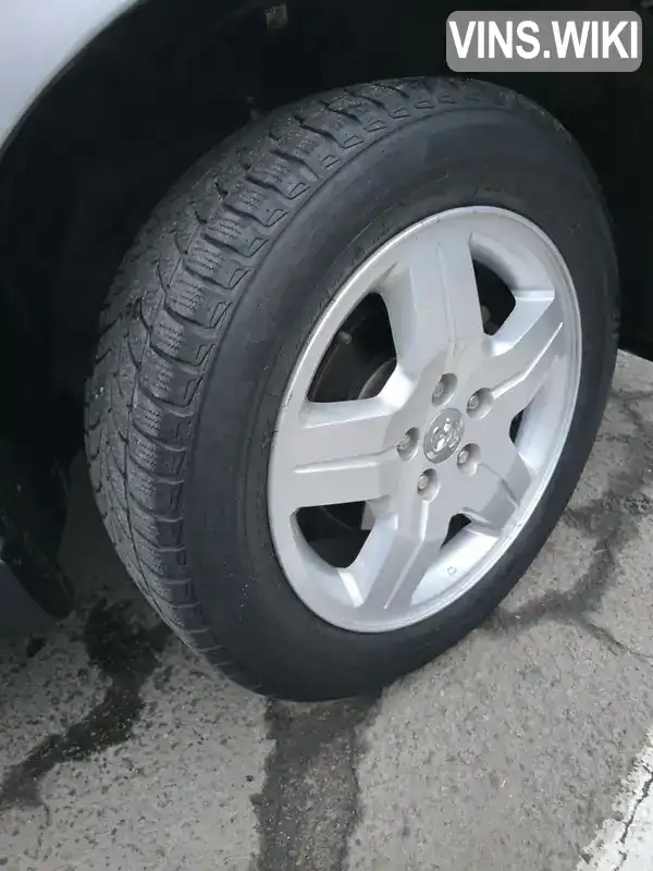Dodge Caliber 2009, фото з оголошення 2 з 17, VIN 1B3HBN8C19D238570