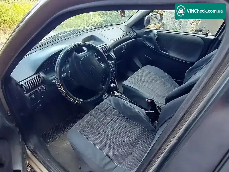 Opel Astra 1998, фото з оголошення 2 з 10, VIN W0L0TFF35W2008775