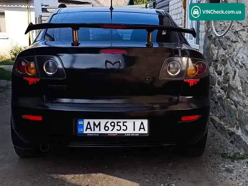 Mazda 3 2004, фото з оголошення 2 з 6, VIN JMZBK12F251181452