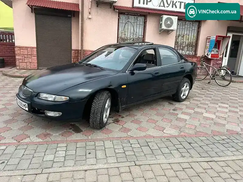 Mazda 626 1996, фото з оголошення 2 з 13, VIN JMZCA12B201209750