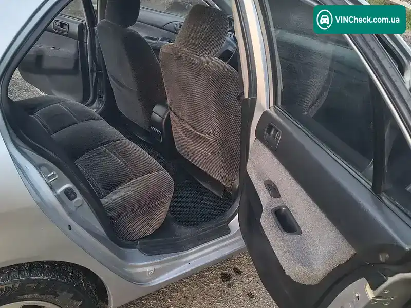 Mitsubishi Lancer 2003, фото з оголошення 2 з 13, VIN JMBSNCS3A4U003738