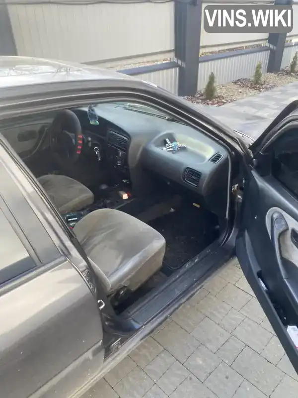 Nissan Primera 1993, фото з оголошення 2 з 8, VIN SJNBCAP10U0333500