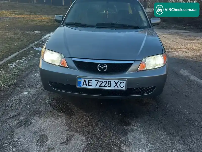 Mazda Protege 2002, фото з оголошення 1 з 13, VIN JM1BJ225X20547175
