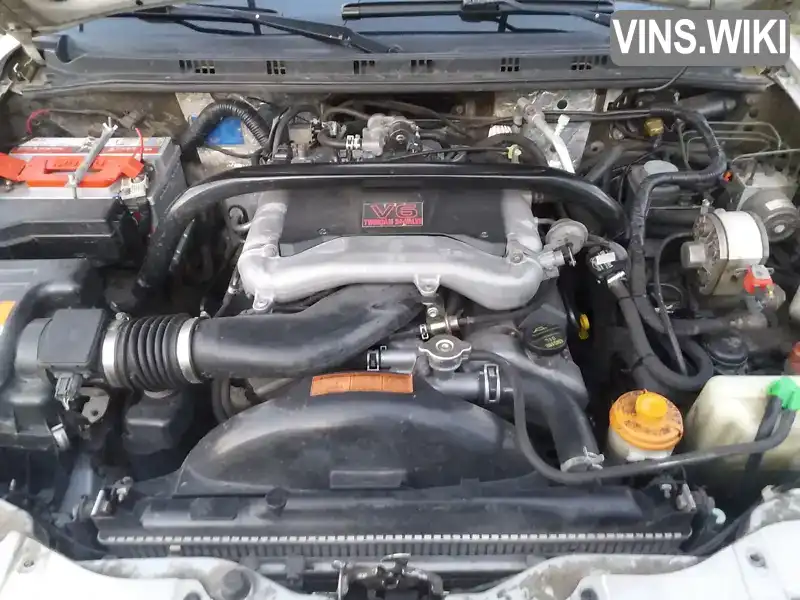 Suzuki Grand Vitara 2003, фото з оголошення 2 з 14, VIN JSAHTX92V00200561