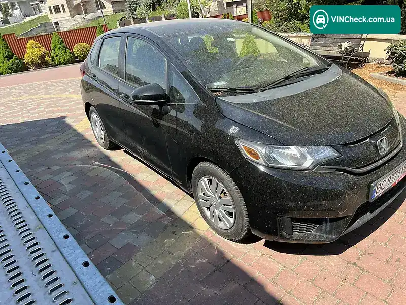 Honda Fit 2014, фото з оголошення 2 з 16, VIN 3HGGK5H51FM734823