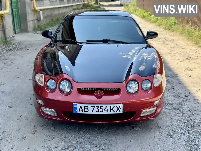 Hyundai Tiburon 1999, фото з оголошення 2 з 21, VIN KMHJG25F4YU159838