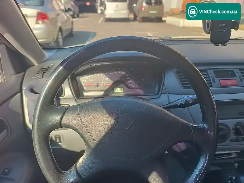 Mitsubishi Lancer 2004, фото з оголошення 1 з 15, VIN JMYSRCS1A4U782980