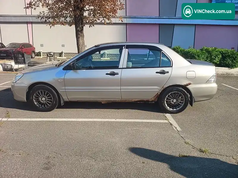 Mitsubishi Lancer 2004, фото з оголошення 2 з 15, VIN JMYSRCS1A4U782980