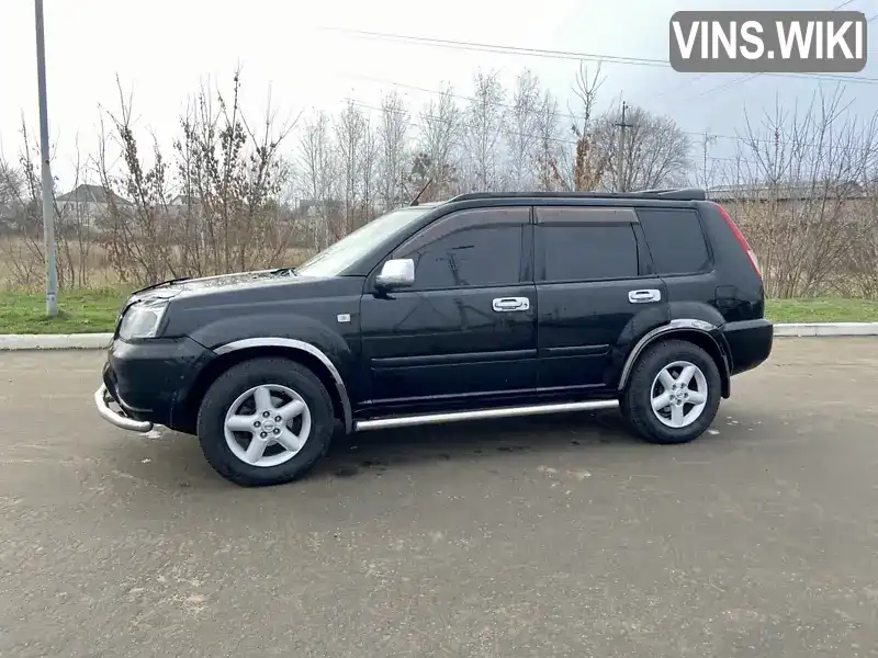 Nissan X-Trail 2004, фото з оголошення 2 з 13, VIN JN8BT05Y24W007196