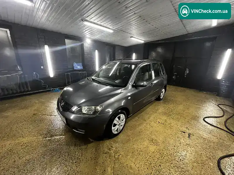 Mazda 2 2004, фото з оголошення 2 з 13, VIN JMZNC2WPJN3E70878
