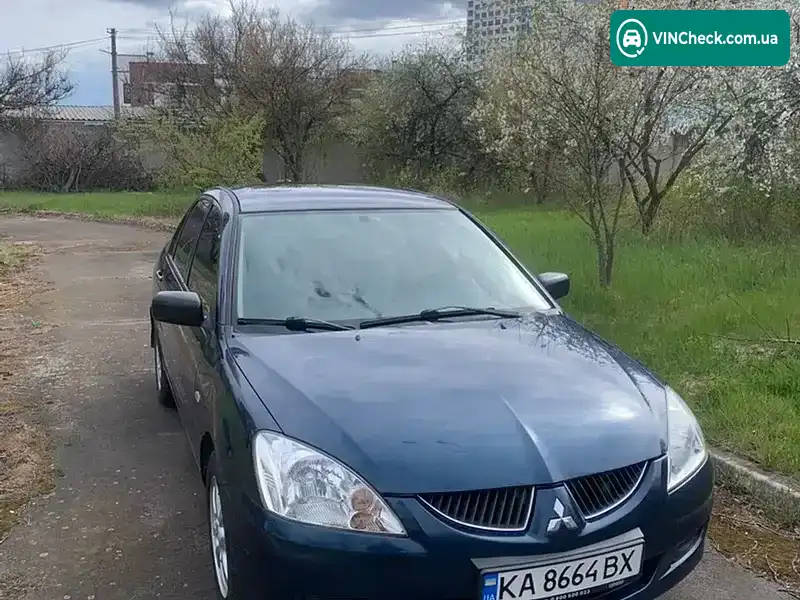 Mitsubishi Lancer 2003, фото з оголошення 2 з 13, VIN JMBSNCS1A4U000409